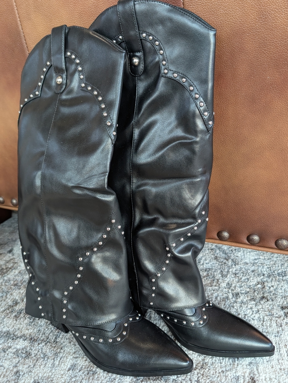 Black Studded Western Knee-High Cowgirl Boots.